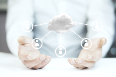 Businessman with cloud  and social network on bokeh technology backgroundの写真素材