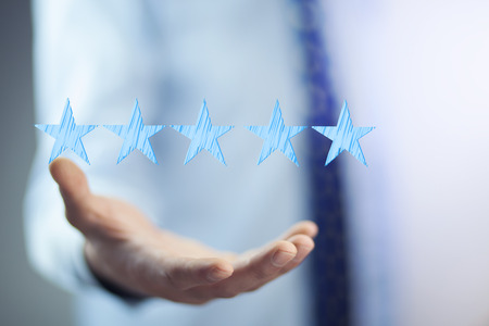young man hand five stars in screen