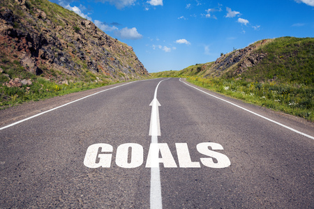goals text written on road against asphalt backgroundの写真素材
