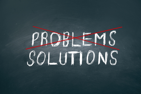 problem or solutions text on board dark backgroundの写真素材
