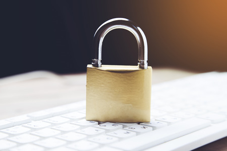 security lock on  computer keyboard - computer security concept