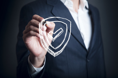 man pen touching protection sign in screenの写真素材