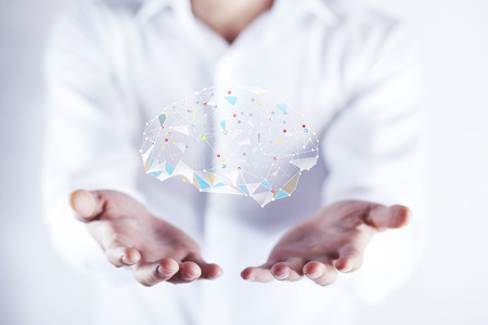 Businessman drawing digital  brain in screen