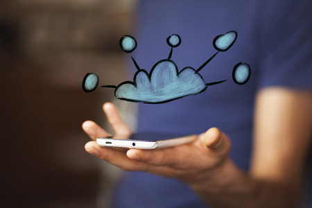 businessman hand smart phone with cloud in screen