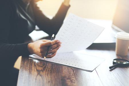 woman hand document and computer in officeの写真素材