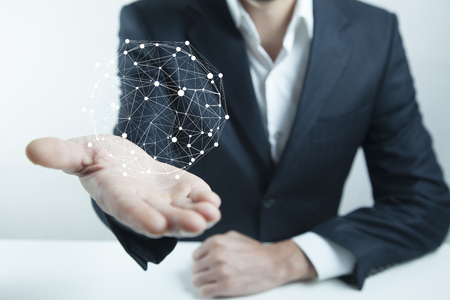 Businessman holding global networkの写真素材