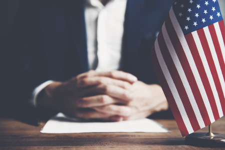 businessman keeping hands with fingers crossedの写真素材