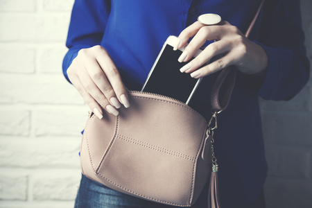 young woman hand  fashion bag and ringの写真素材