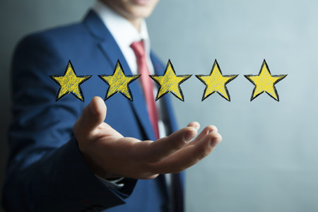 man hand yellow  stars in the screen