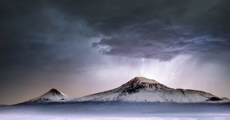 lightning in the mountain Ararat under dark skyの写真素材