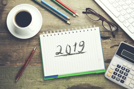 2019 text with keyboard on the notepadの写真素材