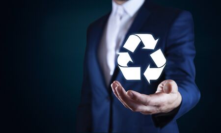 Man hand recycle concept in screenの写真素材