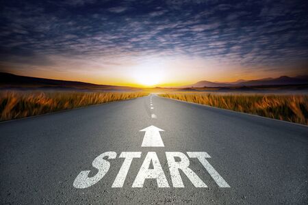 start text on road under sky