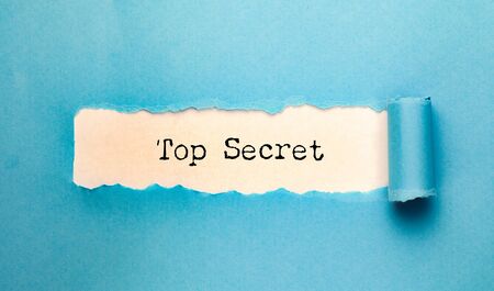 top secret text with torn paperの写真素材