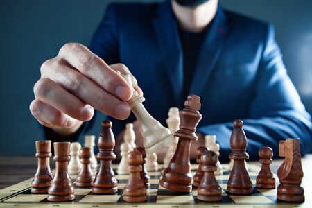 man play chess on boardの写真素材