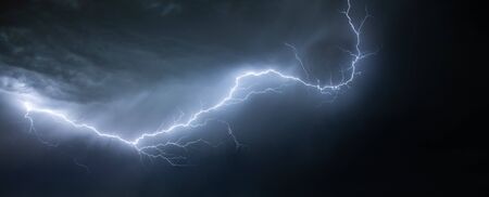Lightning on a dark skyの写真素材