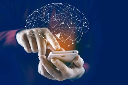 man hand phone with brain in screenの写真素材
