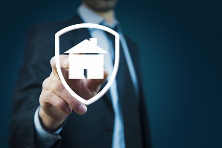 man hand house sign in screenの写真素材