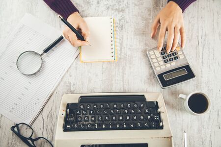 woman hand  typewriter writer on deskの写真素材
