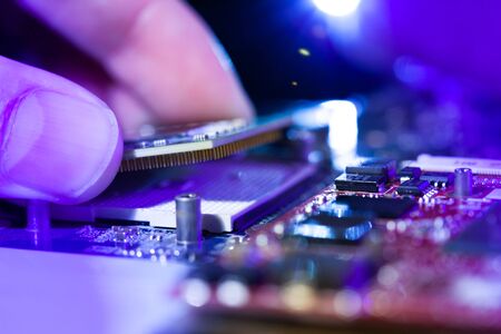 man hand microchip green processor