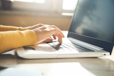 woman hand computer keyboard in officeの写真素材