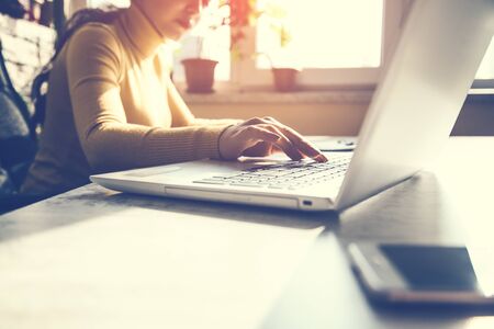 woman hand computer keyboard in office