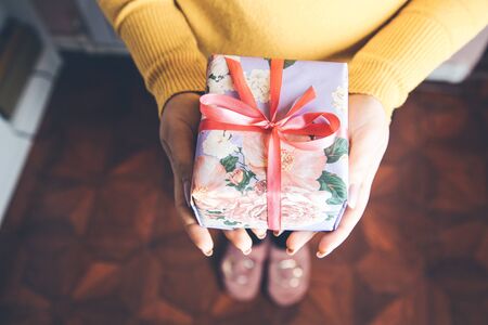 woman hand beautiful gift boxの写真素材