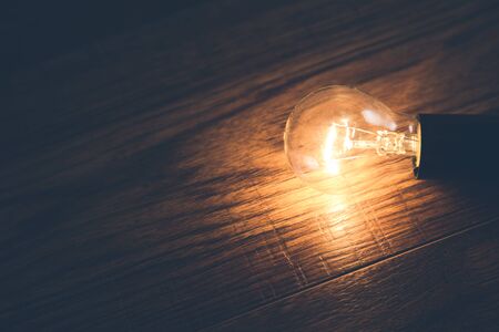 light bulb on dark table