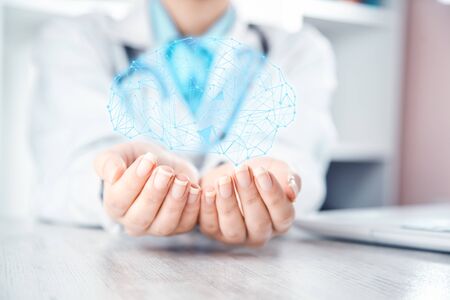 woman doctor hand brain in screen