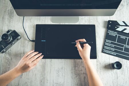 woman hand computer with tablet and movie sign