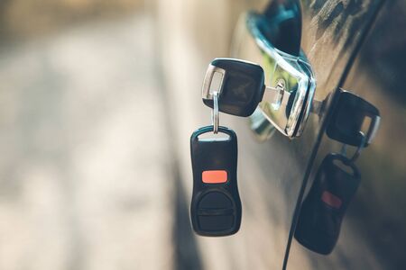 black key on black car in natureの写真素材