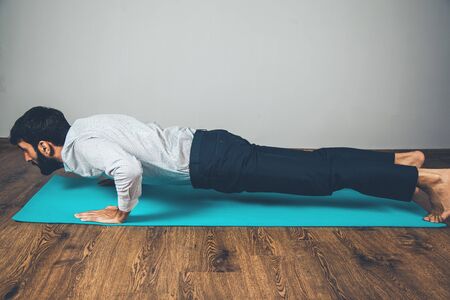 young business man practicing on the carpetの写真素材