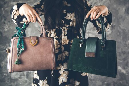 young woman hand bag on abstract backgroundの写真素材