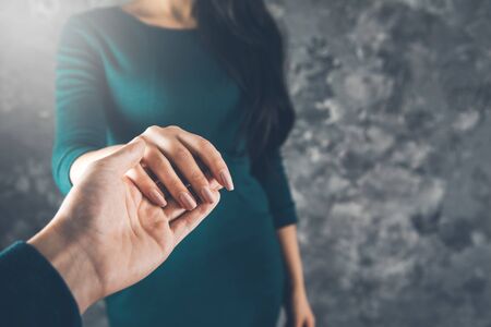 lovely woman and man hands on abstract backgroundの写真素材