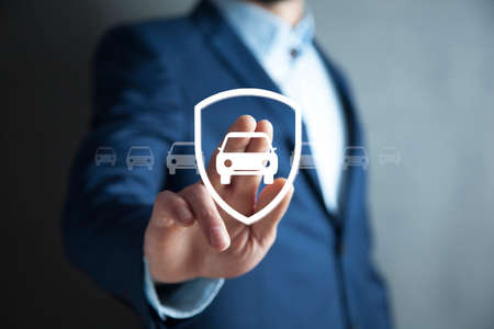 man touching in car in the screenの写真素材