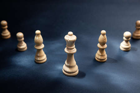 chess stones on the dark table backgroundの写真素材
