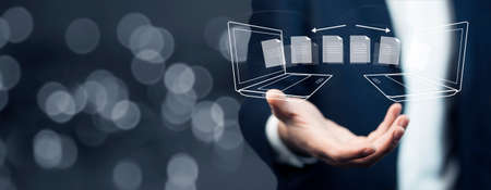 man hand transfer file in screen on bokeh background