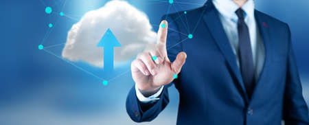 Business man holding with upload in screen