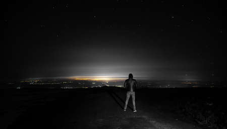 man in high under the stars background
