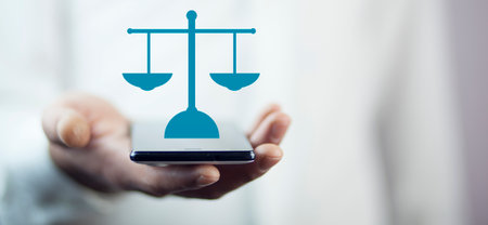 Man holding phone with a Technology justice iconの写真素材