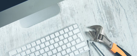 tool on the keyboard on the deskの写真素材