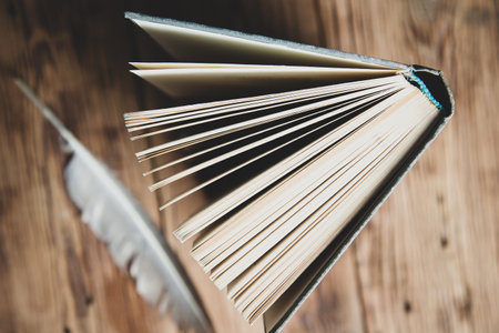 books page on the wooden desk background