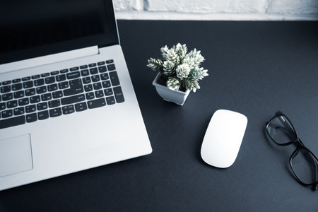 mouse with glasses and keyboard on the desk