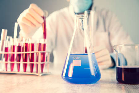 Biochemistry laboratory research, Chemist is analyzing sampleの写真素材