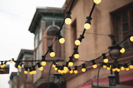 light bulbs in street backgroundの写真素材