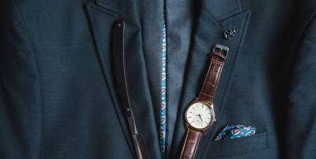 brown fashion watch on the suit background