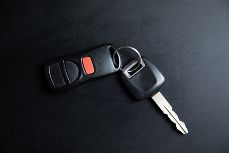 car key on the black table background