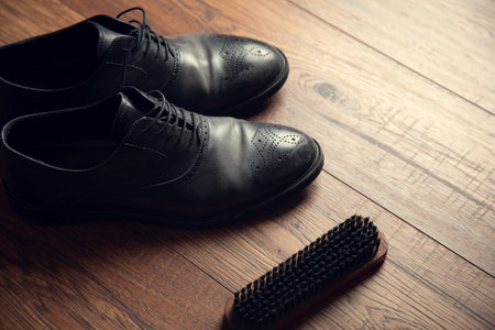 clearly and shoes on the wooden table backgroundの写真素材