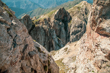rocks and mountains under blue sky backgroundの写真素材