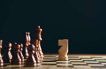 chess on the board on the dark backgroundの写真素材